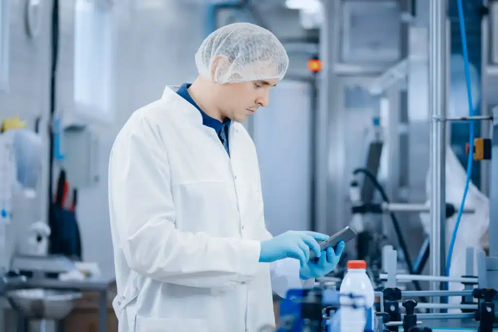 food-industry-worker-inspecting-production-line