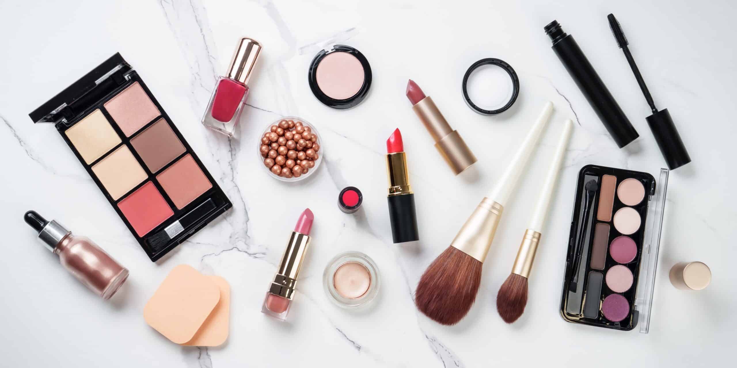 Make up products at white background scaled